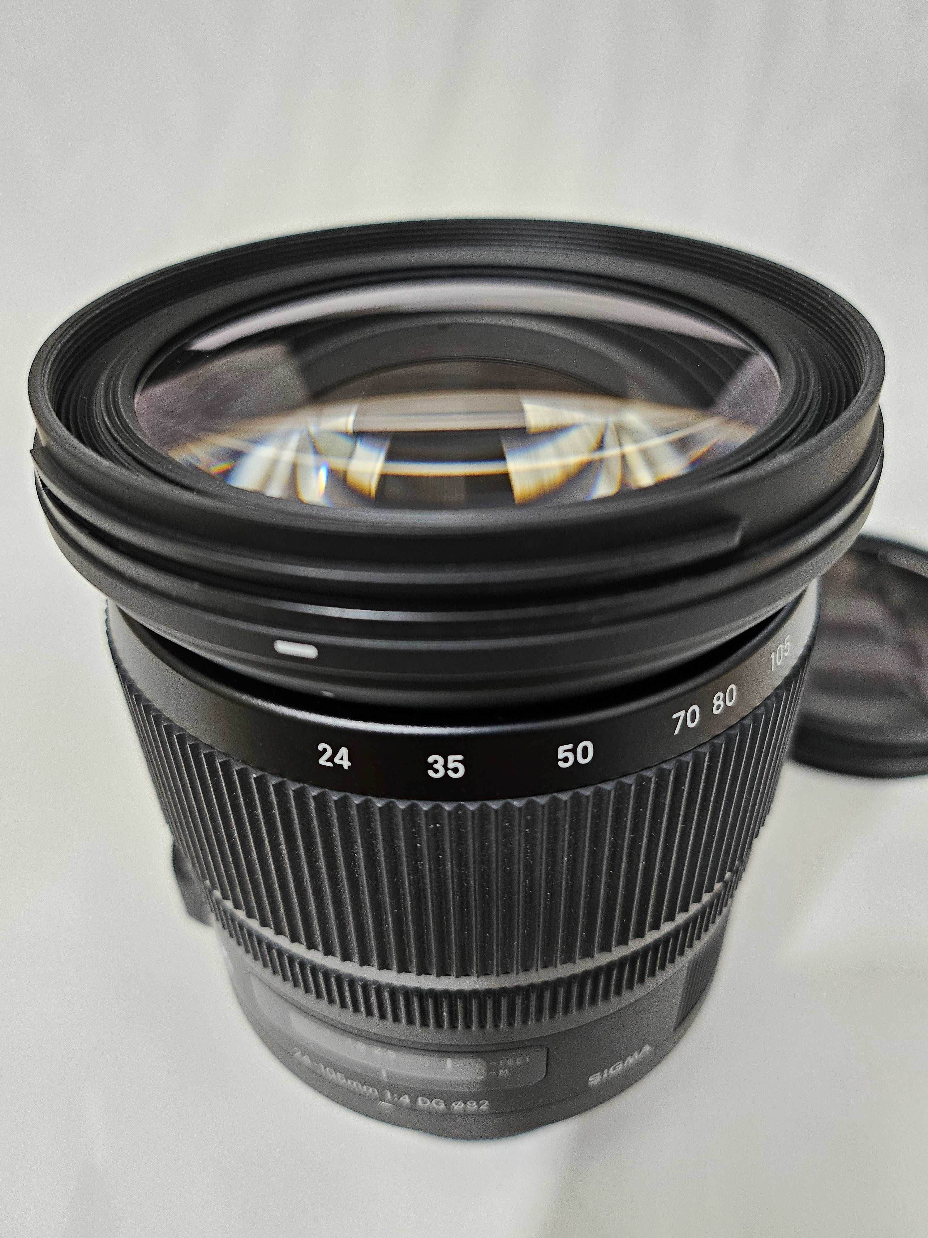Sigma 24-104 mm Art, f4, Nikon F mount + accesorii; stare ireproșabilă