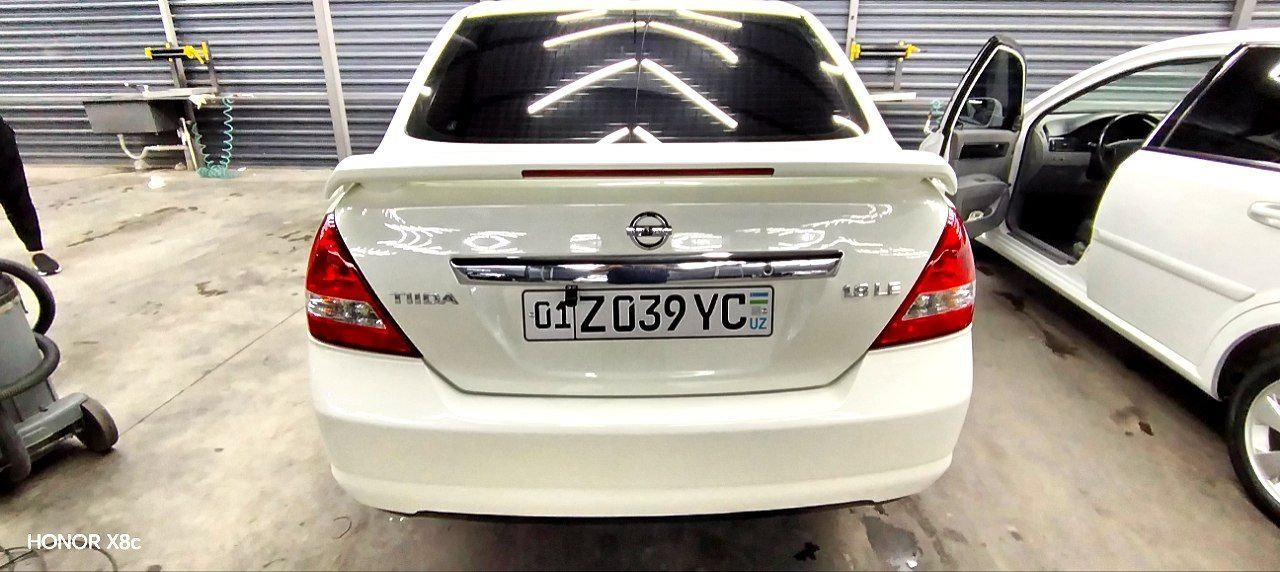 Nissan tiida 1.8 2008 йил холати идеалний