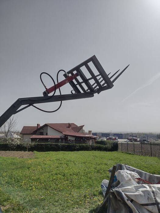 Încărcător in tirant