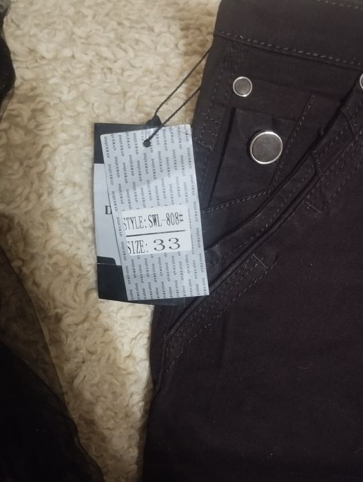 Продаю брюки . Коричневого цвета.