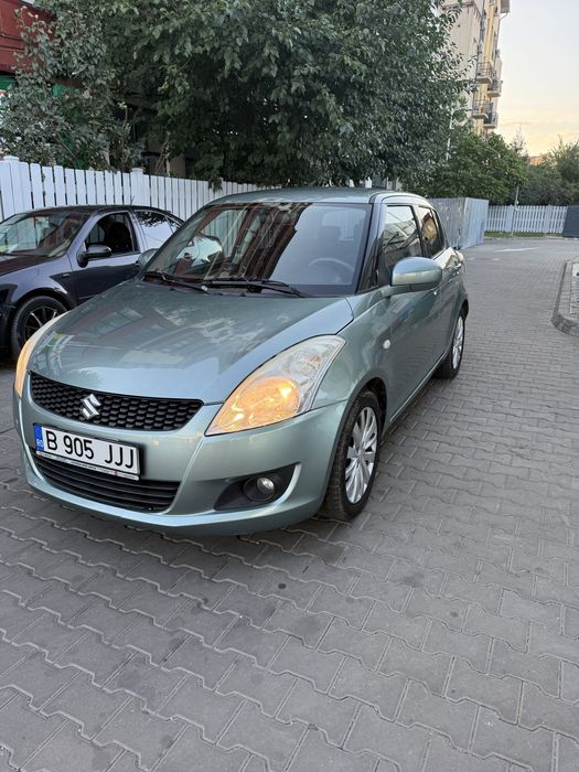 Suzuki swift  an 2011 autoamata 1.3 benzina