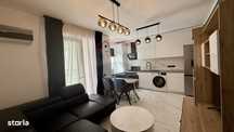 Apartament modern, cu curte și două locuri de parcare-bloc nou