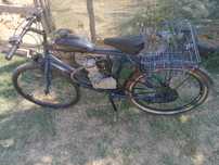 Bicicleta cu motor de 50cc