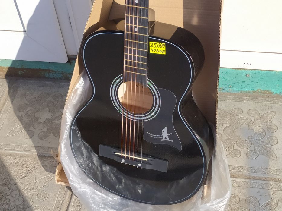 Новая акустическая гитара
