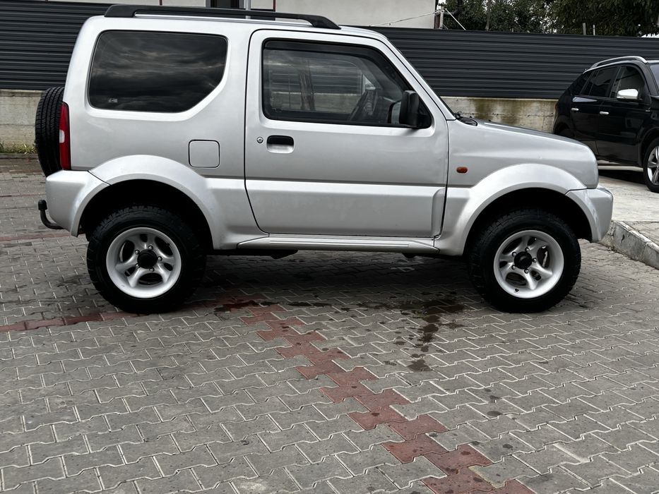Suzuki jimny 4x4 cu reductor la maneta , 2006 aer conditionat