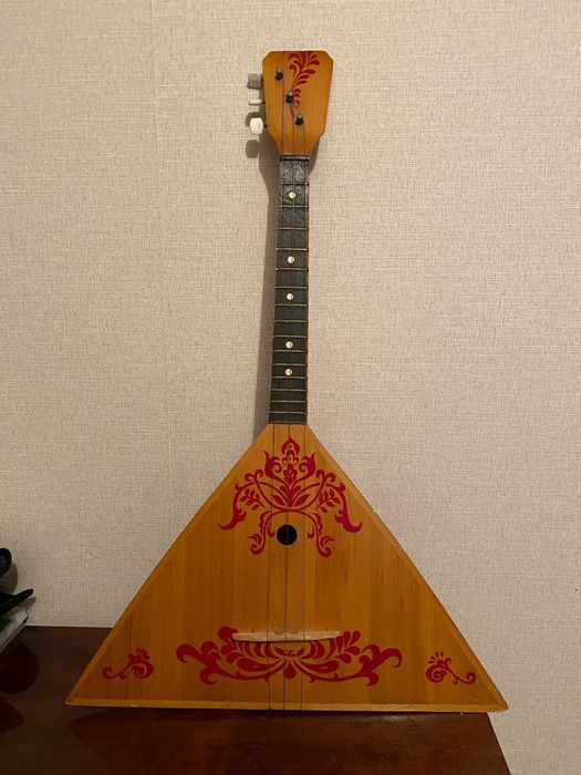 Балалайка музыкальный инструмент