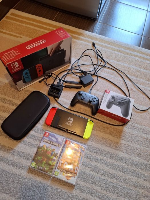 Nintendo switch + controller wireless + 3 jocuri