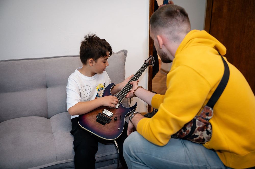 Lecții de chitară la One Music Academy – Prima lecție este GRATUITĂ!