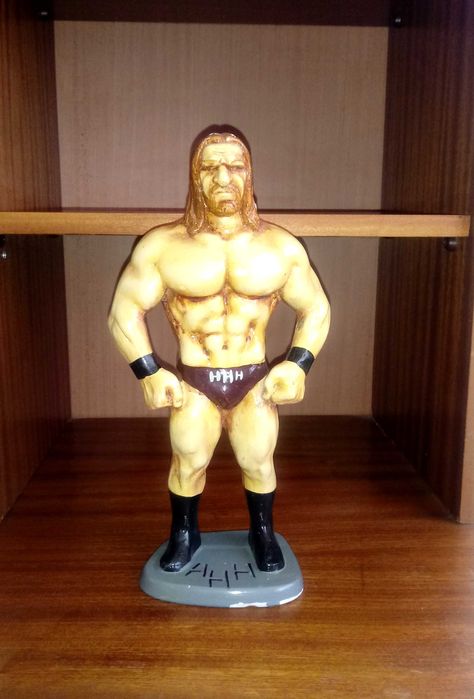 Статуетка на Трите хикса (Triple H)