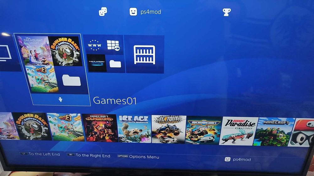 PlayStation 4 Slim Modat 1Tb +2 controllere +20 jocuri.