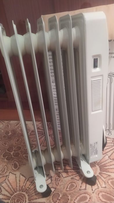 Продам радиатор масляный.