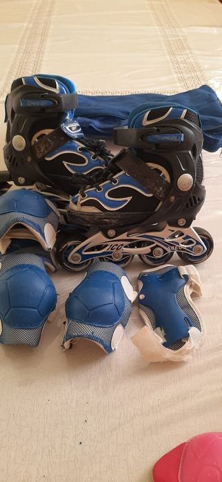 Роликовые коньки