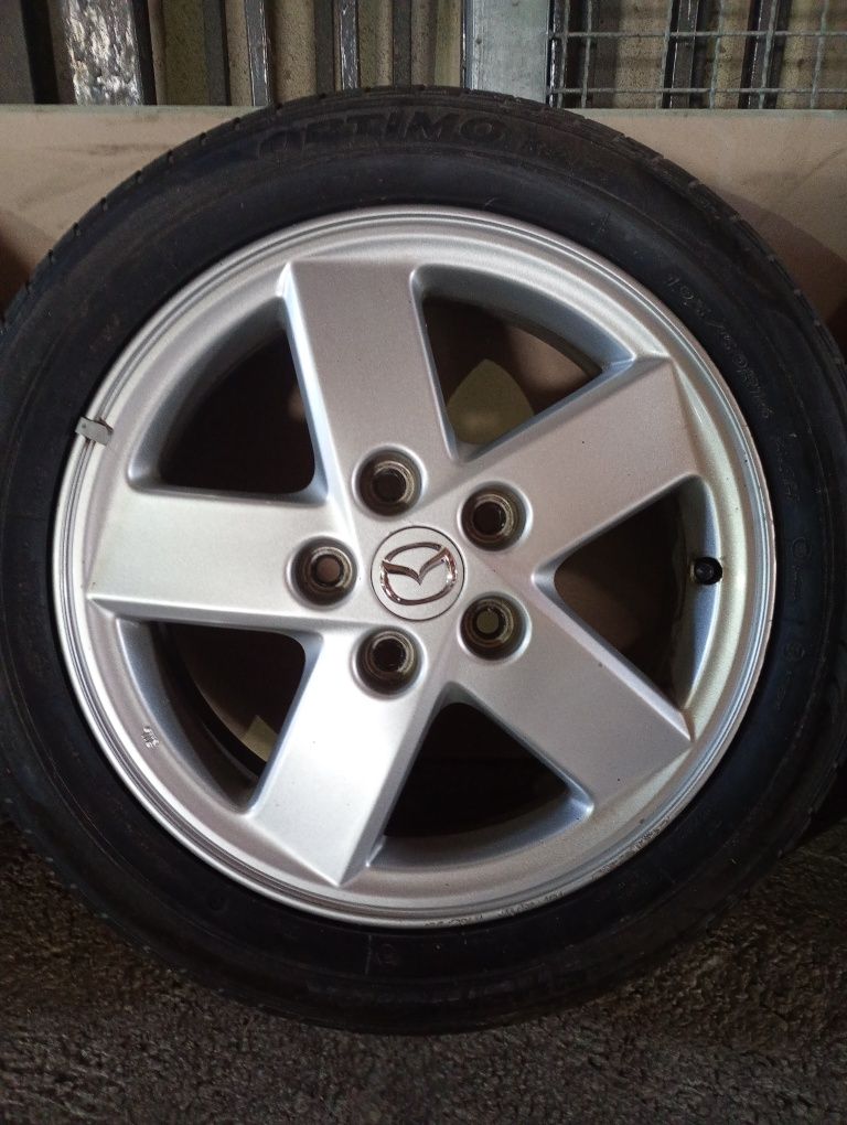 MAZDA оригинални джанти със летни гуми 195/50/16 6 J ET50 цо 66