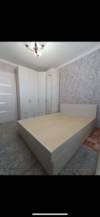 Кровать с подъемным механизмом