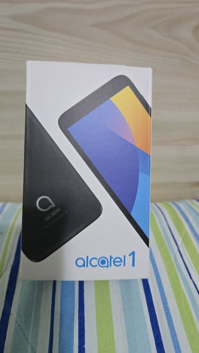 Телефон alcatel 1