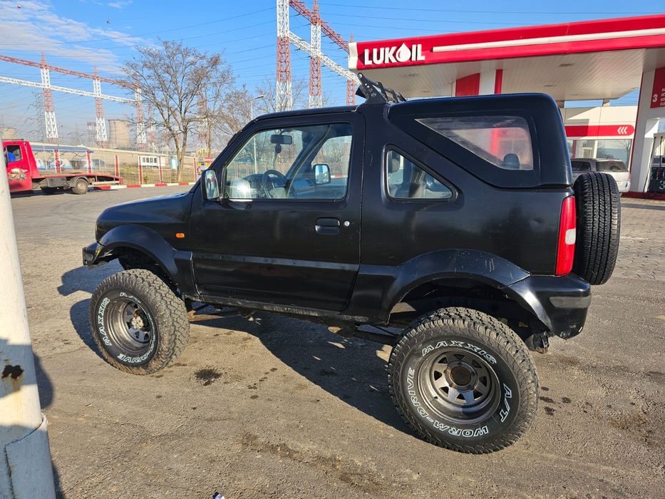 Suzuki Jimny an 2001,  motor 1.6 Suzuki Baleno, AC, blocant fata/spate