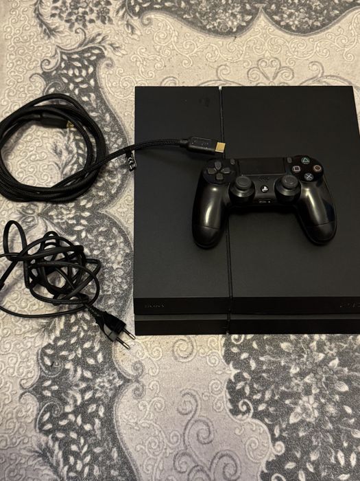 playstation 4 1 TB o maneta