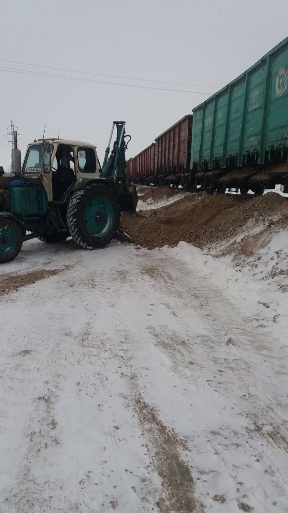 Услуги экскаватора, погрузчика 2кубового планировка септики, колодцы,