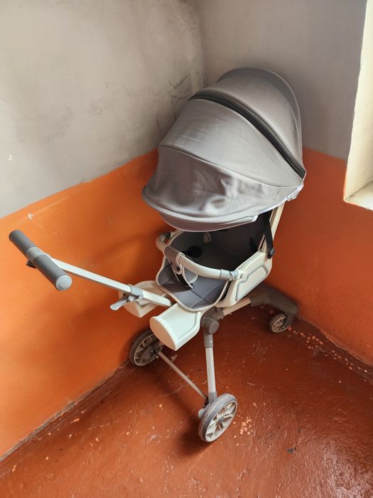 Коляска дрон серый