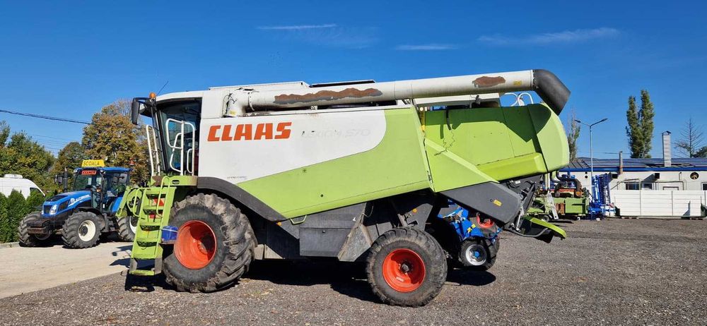 Combina CLAAS Lexion 570 + Heder Paioase 7,5m – 290 kW – An 2010
