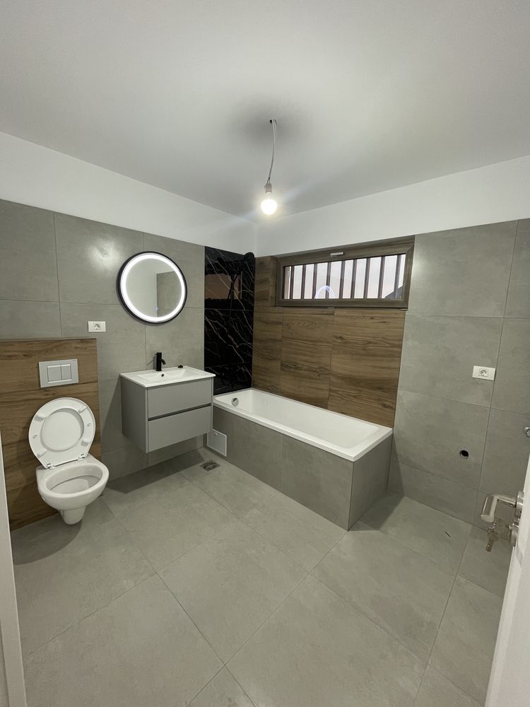 Apartamente cu două camere finalizate , grădină  proprie si parcare