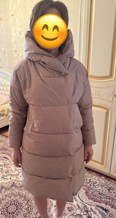 Продам пуховик новая