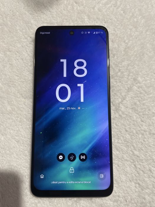 Vând telefon moto aproape nou