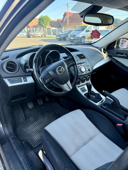 Mazda 3 2009 105cp