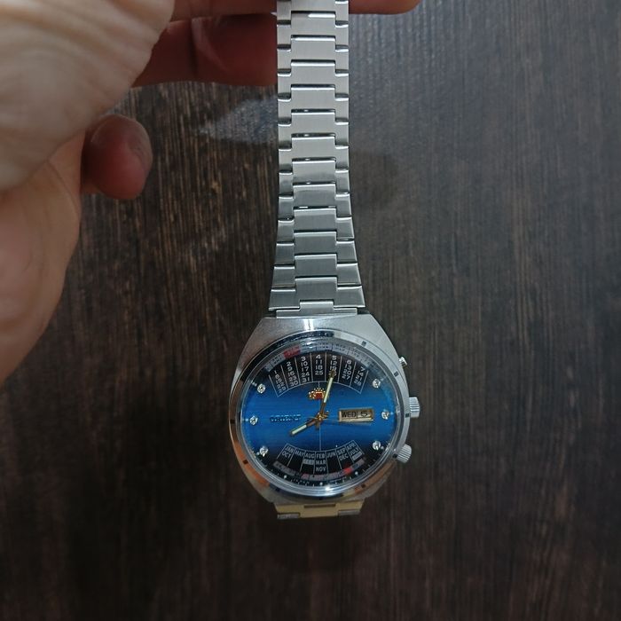 Часы Orient College