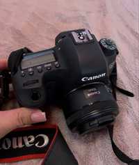 новый Фотоаппарат Canon