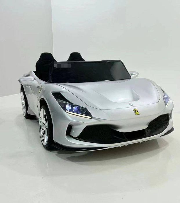 Икки у́риндикли энг катта Ferrari F8 болалар машинаси