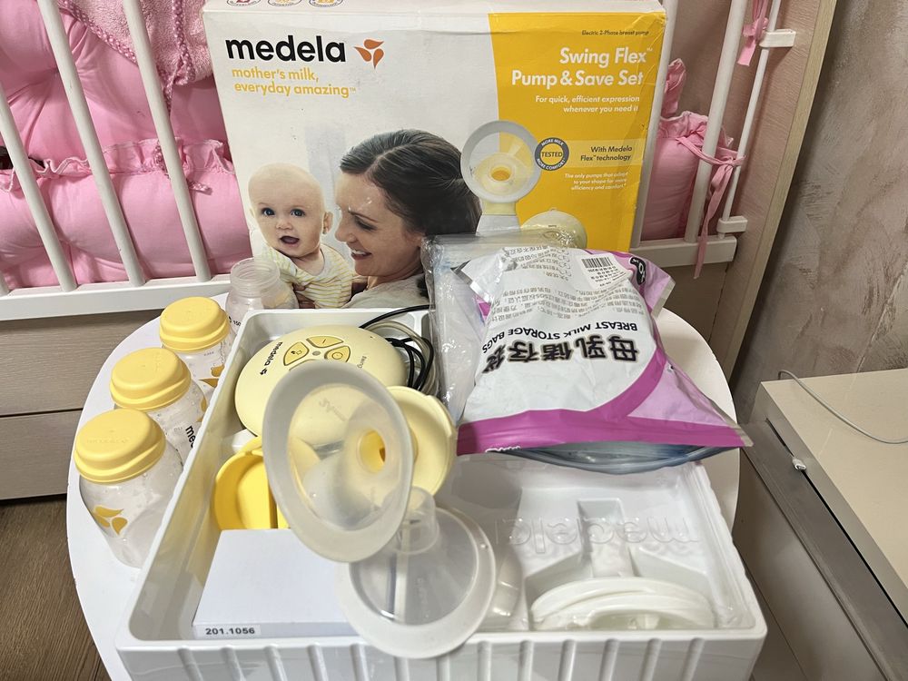 Помпа за кърма medela swing flex