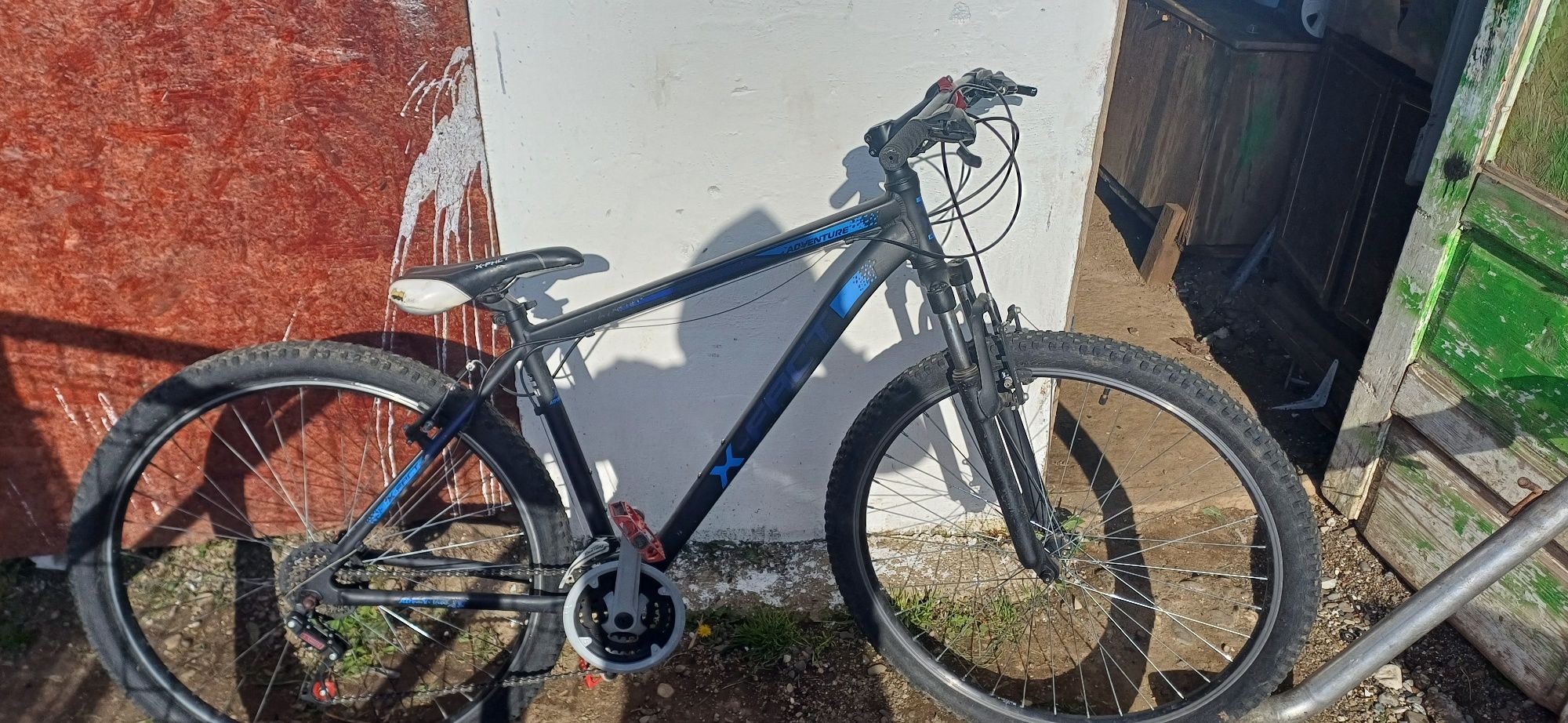 Vând bicicleta x-fact și piese de scuter