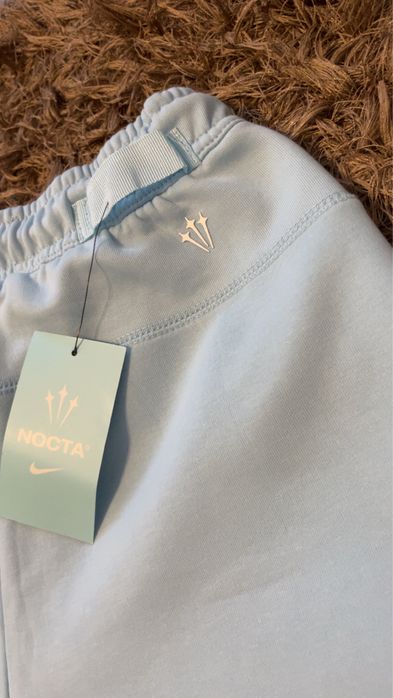 Pantaloni Nike Tech X Nocta albastri