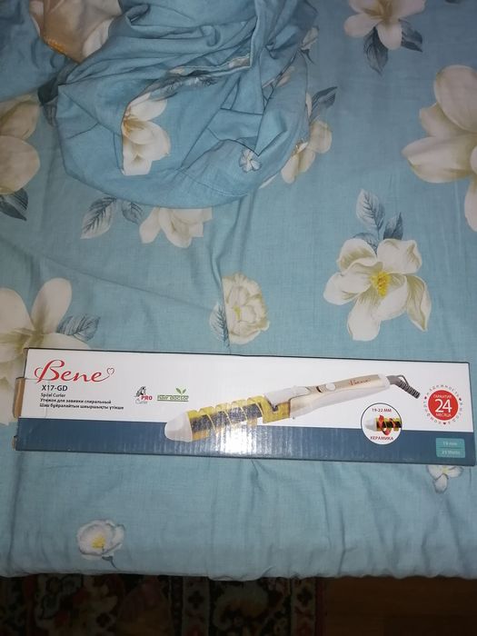 Утюжок для завивки.