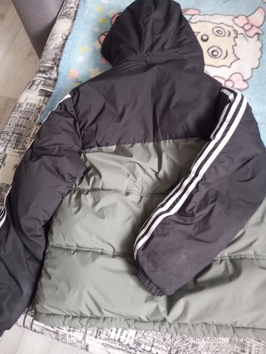 Продам новую зимнюю куртку -пуховик