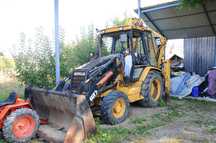 Buldoexcavator Caterpillar 428C an 1998 ore 3.700 acte import Italia