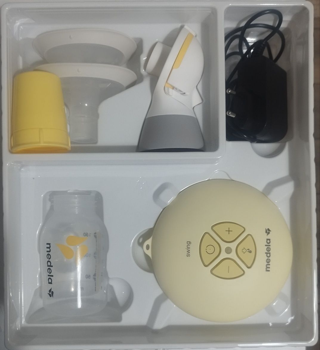 MEDELA Единична двуфазна електрическа помпа за кърма Swing Flex