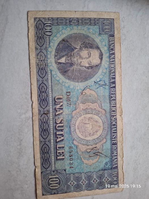 Moneda 20 pence, Elizabeth I', 1982 si bancnota 100 lei cu Balcescu
50