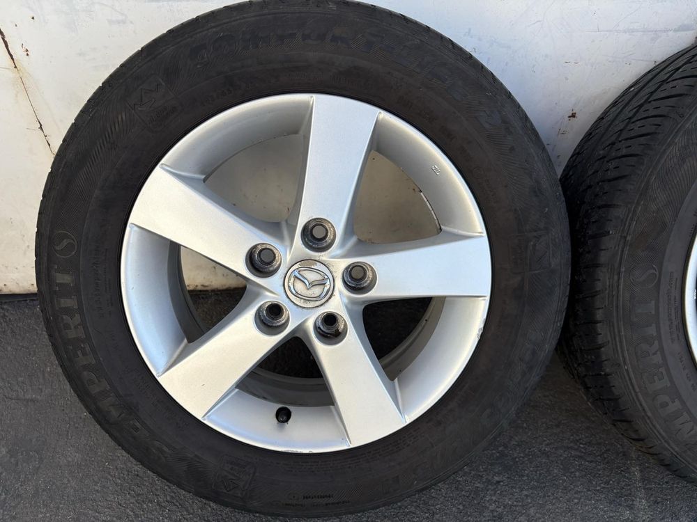 4бр. Алуминиеви джанти с гуми 195/65 R15цола от Mazda  5x114.3