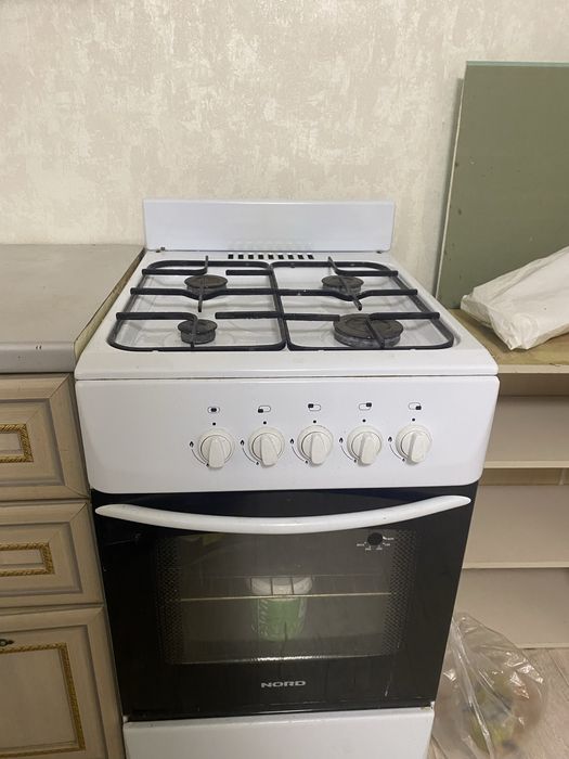 газовая плита с комфорками и духовкой