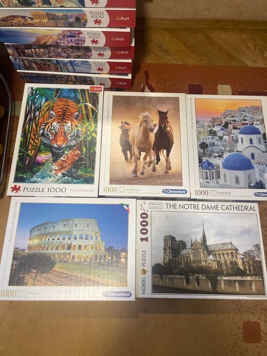 Vand cutii puzzle complete de  1000 buc.