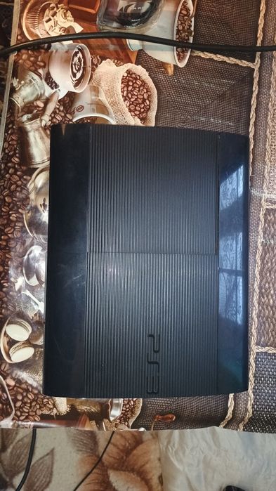 PS3 Super Slim + 2 controllere + jocuri populare