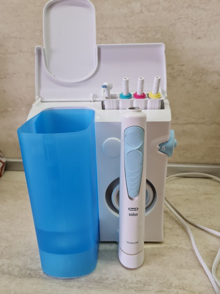 Braun water jet система за почистване на зъби