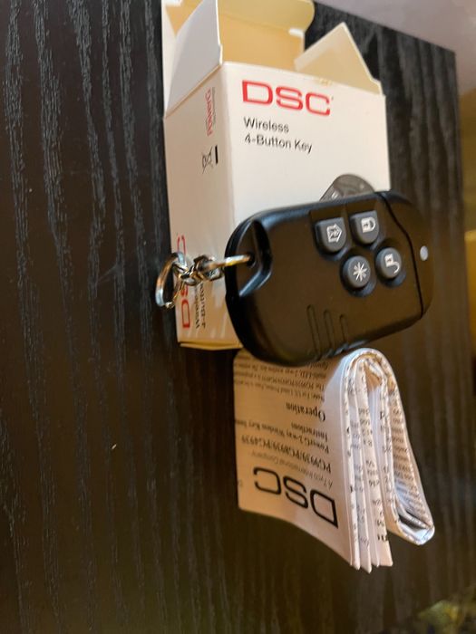 Telecomanda sistem alarma cu 4 butoane DSC seria Neo.