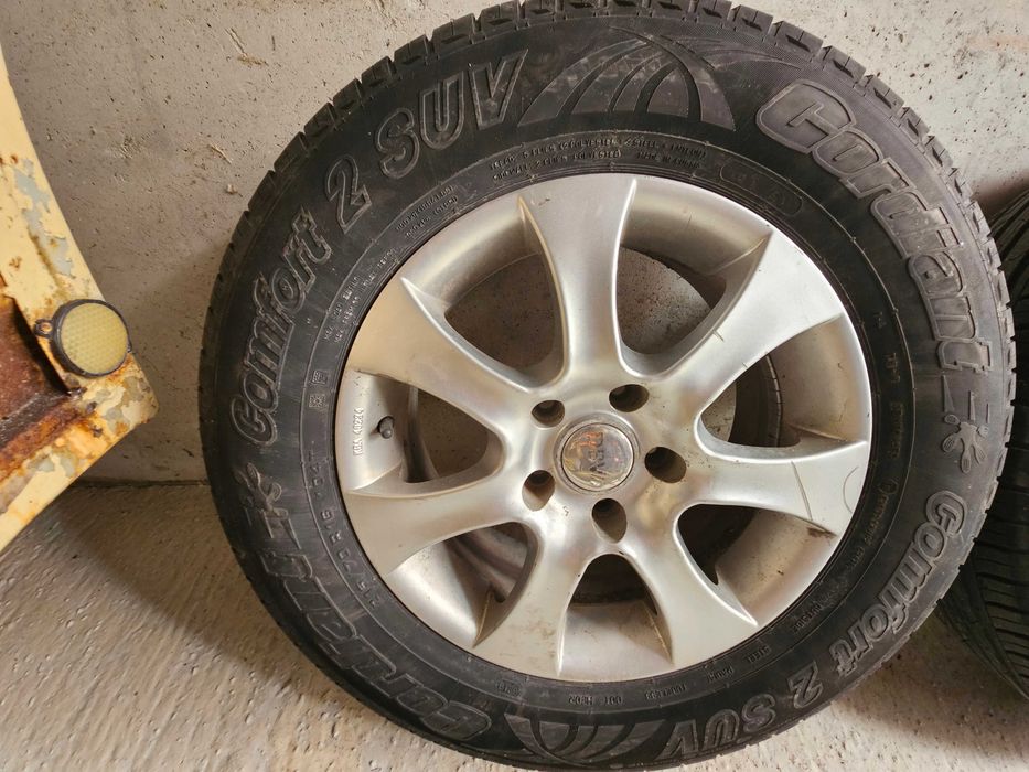 Джанти 5x114.3 16 с гуми 215 70 16 Дачия дъстър