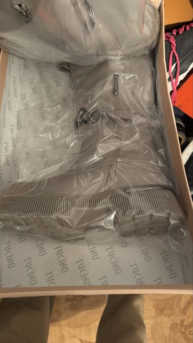 Продам новые зимние сапоги Tucino.