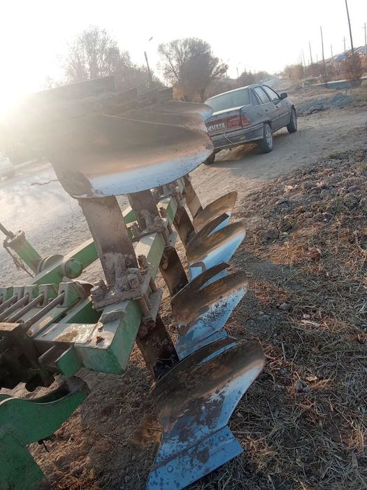 New Holland aylanma puliq bilan