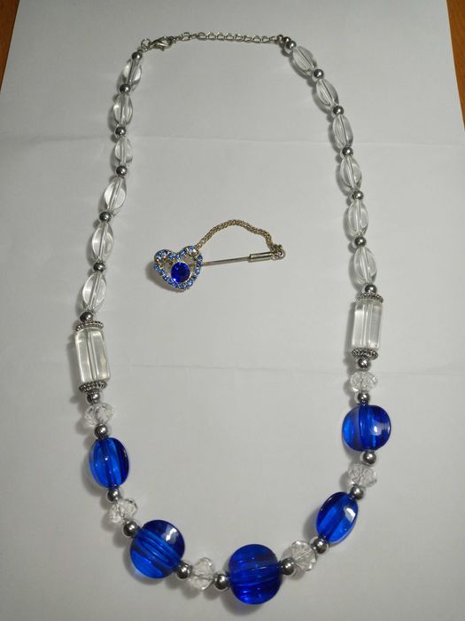 Украшение ожерелье, серьги и брошь.Цена 80 тыс за все