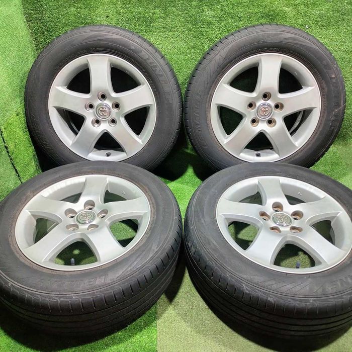 Продам Оригинальный диск Toyota Camry 35 с шинами летний 215/60 R16